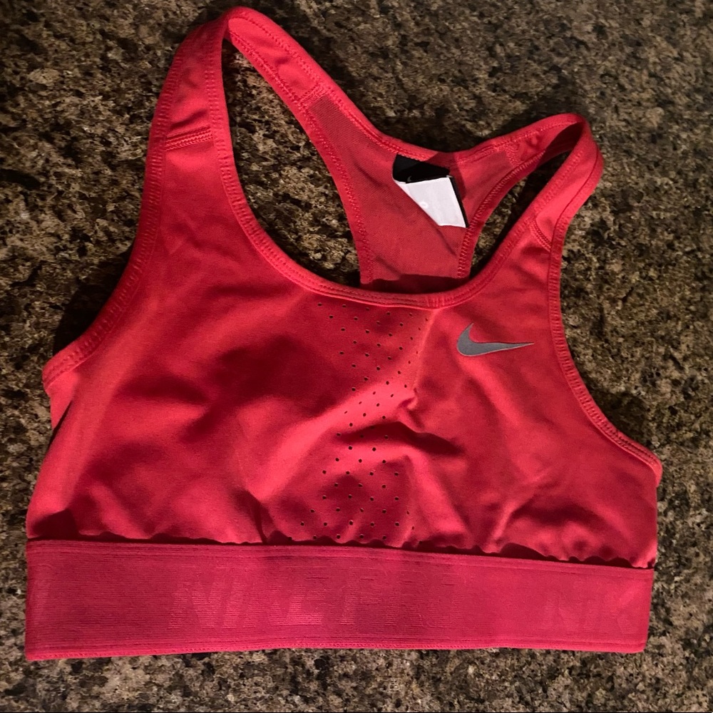 NIKE pink medium support sports bra